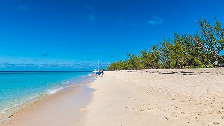 A view along a secluded beach on the island of Grand Turk on a bright sunny morning